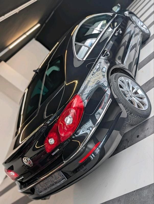 Second-hand VW Passat 170 CP (125 kW) 2011 Negru Berlinǎ