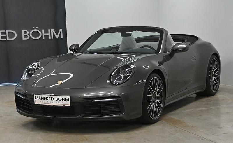 Grün Gebraucht 2023 Porsche 911 Carrera 4 Cabriolet Cabrio | 145.670 € (Etwas zu teuer) - Bild 1/4
