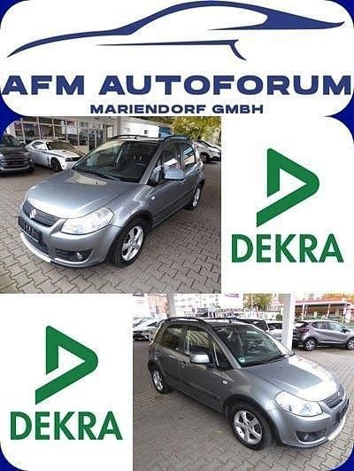 Grau Gebraucht 2007 Suzuki SX4 Comfort Limousine | 5.999 € (Fairer Preis) - Bild 1/4