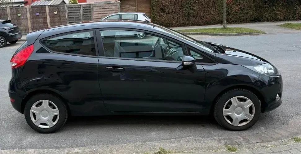 Gebraucht Ford Fiesta Trend 60 PS (44 kW) 2011 Schwarz Kleinwagen