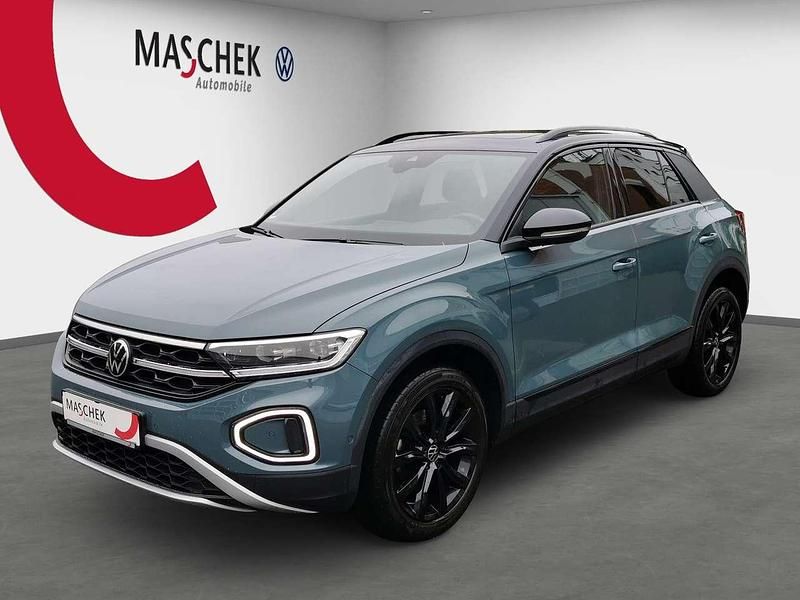 Petroleum blue metallic deep b Gebraucht 2022 VW T-Roc Style SUV | 26.840 € (Etwas zu teuer) - Bild 1/4