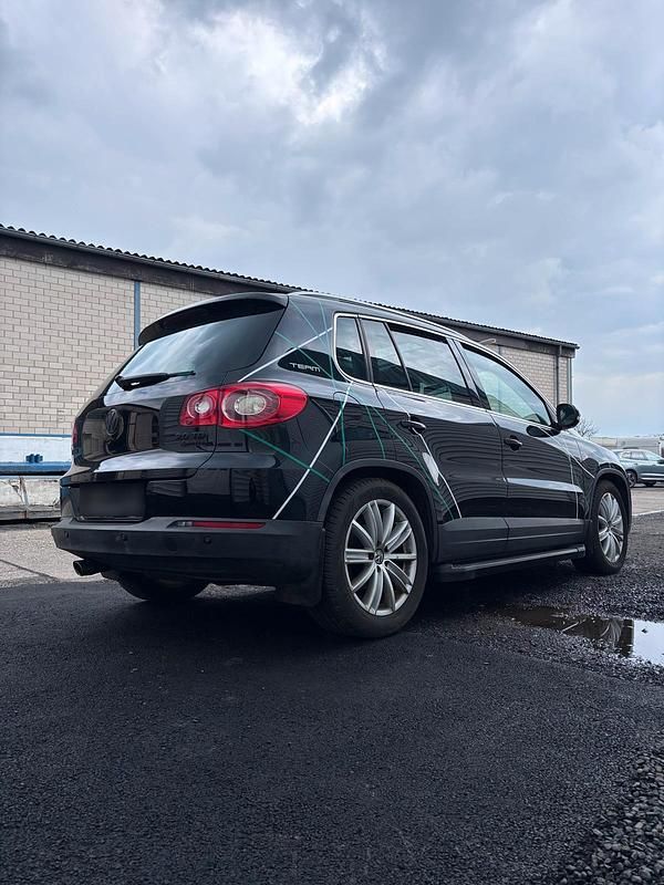Gebraucht VW Tiguan Team 170 PS (125 kW) 2010 Schwarz SUV