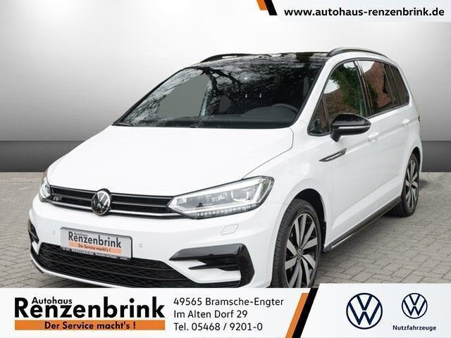 Weiß (pure white schwarz) Gebraucht 2024 VW Touran Highline Van / Kleinbus | 42.290 € (Teuer) - Bild 1/4