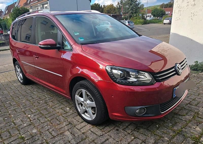 Rot Gebraucht 2013 VW Touran Highline Van / Kleinbus | 8.699 € (Fairer Preis) - Bild 1/4