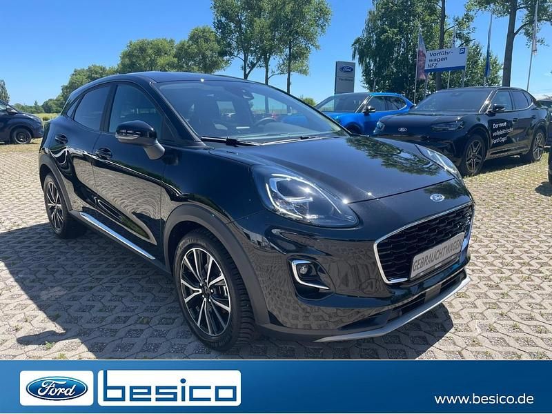Agate black metallic Gebraucht 2022 Ford Puma Gen-E Titanium X SUV | 19.980 € - Bild 1/4