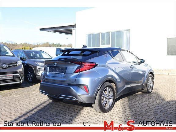 Gebraucht Toyota C-HR+ Plus 184 PS (135 kW) 2019 Sodalithblau metallic / dach schwarz