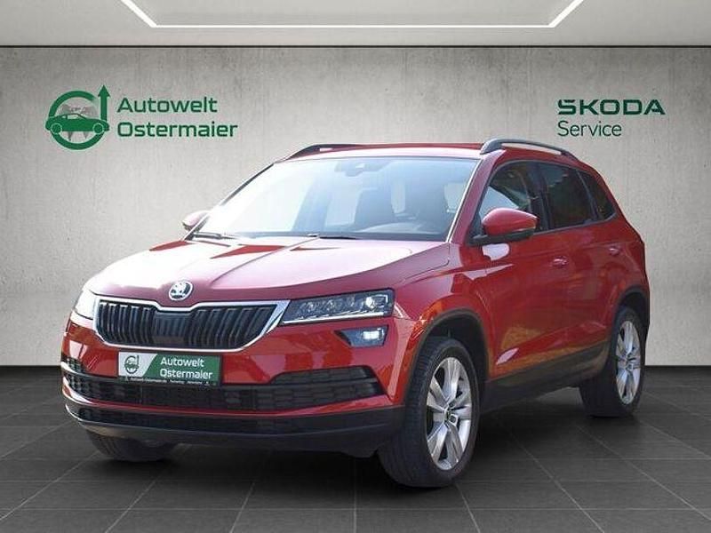 Velvet rot metallic Gebraucht 2019 Skoda Karoq Style SUV | 25.285 € (Fairer Preis) - Bild 1/4