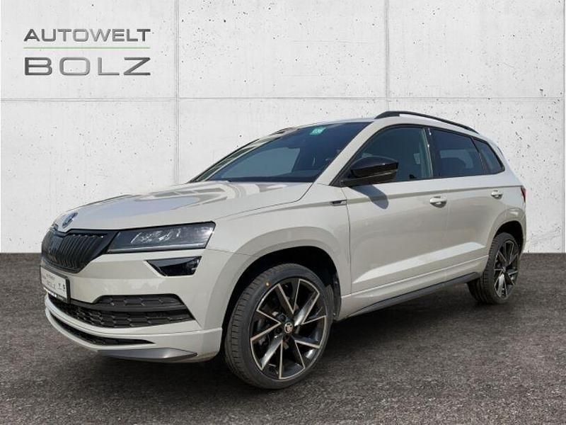 Grau Gebraucht 2021 Skoda Karoq SportLine SUV | 28.790 € (Fairer Preis) - Bild 1/4