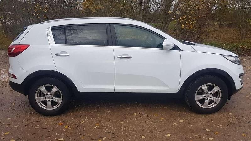 Weiß Gebraucht 2013 Kia Sportage Spirit SUV | 8.890 € (Guter Preis) - Bild 1/4