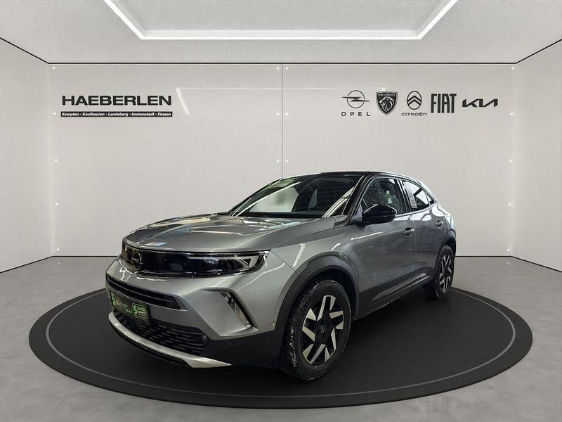 Gebraucht Opel Mokka Elegance 131 PS (96 kW) 2022 Kontrast grau/quarz silber SUV
