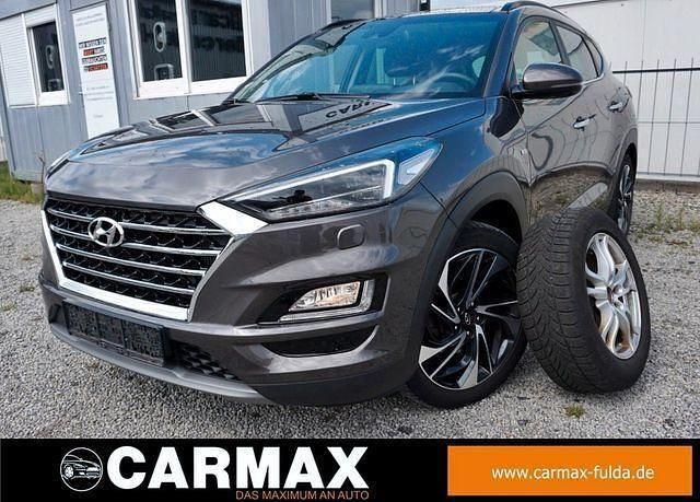 Grau Gebraucht 2019 Hyundai Tucson Premium SUV | 22.900 € (Fairer Preis) - Bild 1/4
