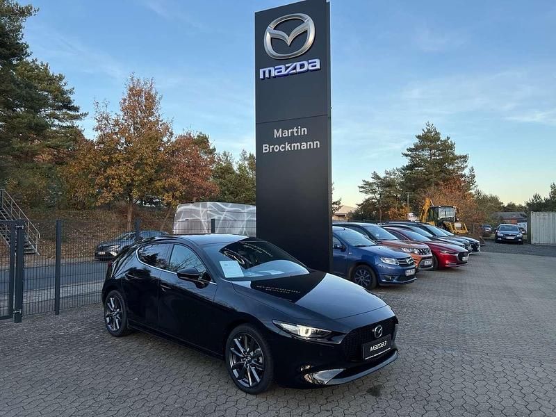 Jet black Neu 2025 Mazda 3 Exclusive-Line Limousine | 28.660 € - Bild 1/4