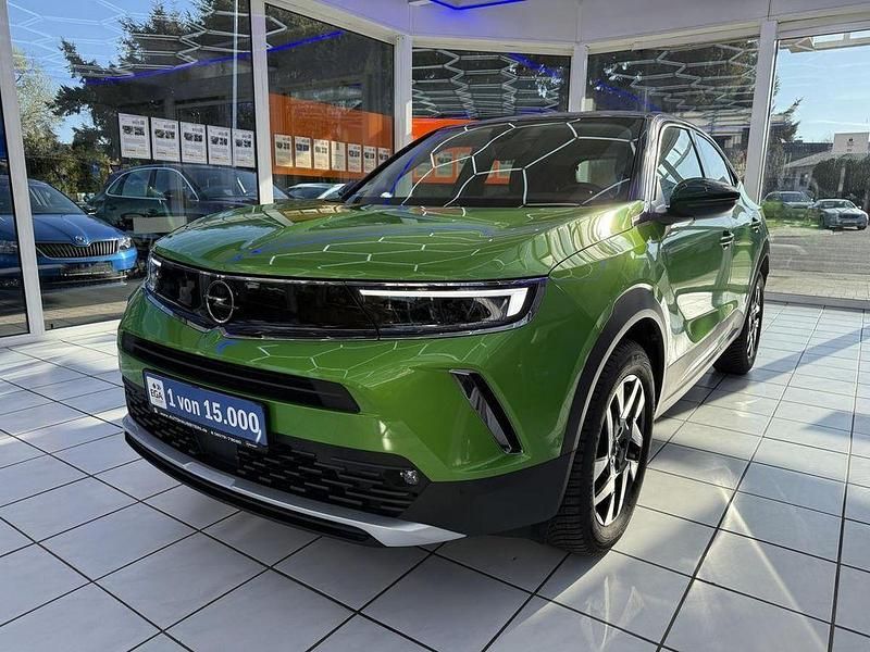 Gebraucht Opel Mokka Elegance 131 PS (96 kW) 2023 Matcha green/ikone gruen SUV