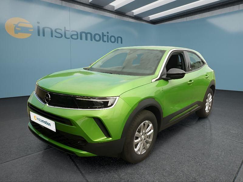 Grün Gebraucht 2021 Opel Mokka-e SUV | 16.749 € (Fairer Preis) - Bild 1/4
