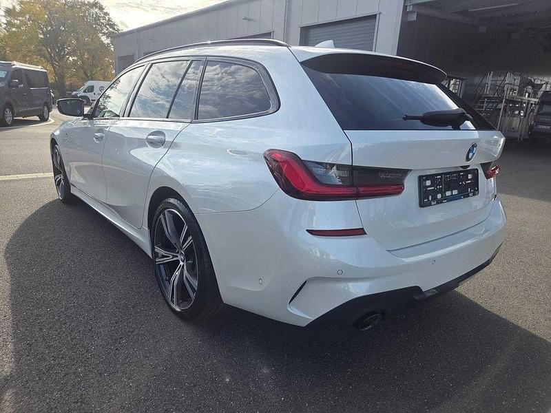 Gebraucht BMW 320e Performance 204 PS (150 kW) 2021 Weiß (metallic) Kombi