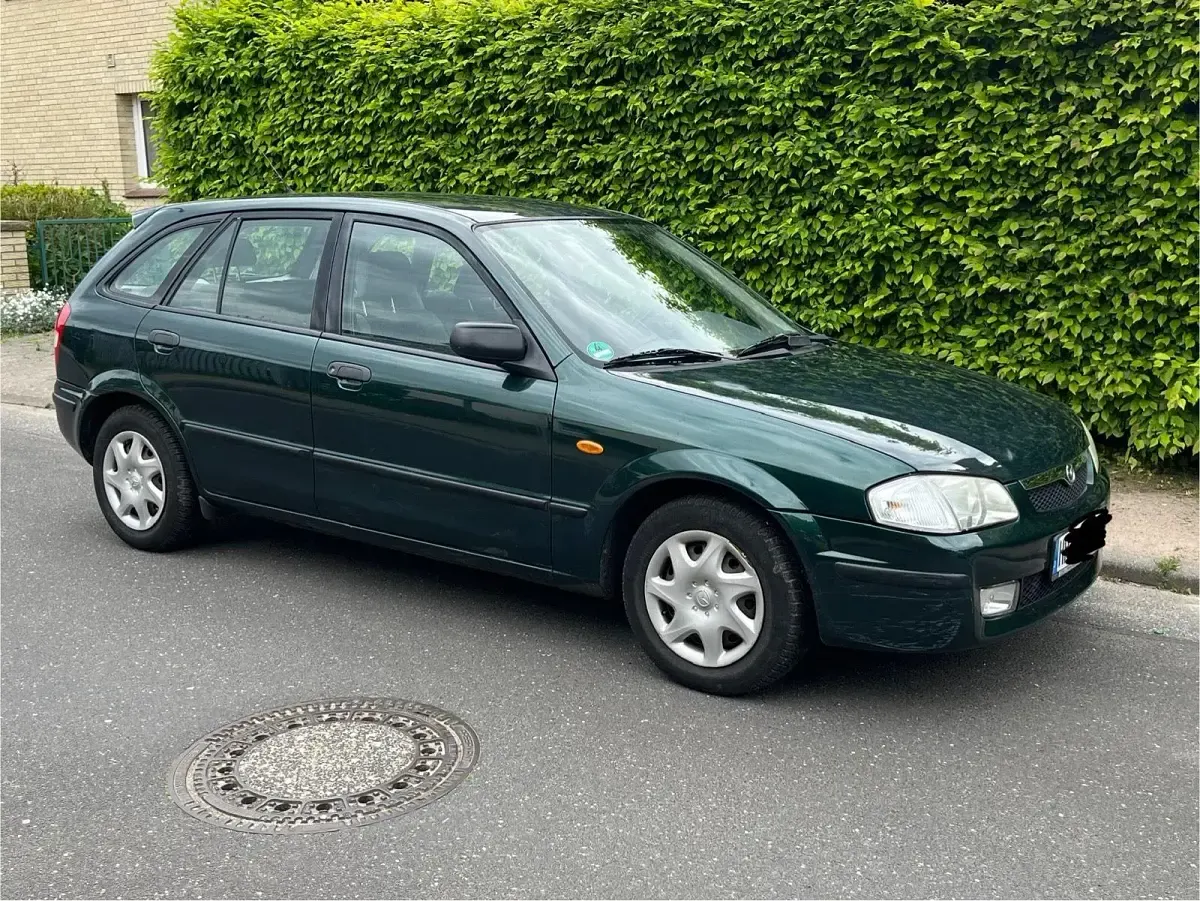 Gebraucht Mazda 323F 73 PS (53 kW) 1998 Grün Kombi