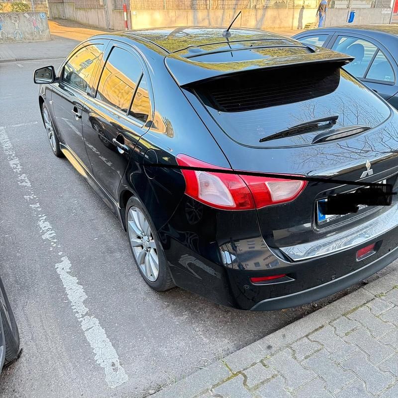 Gebraucht Mitsubishi Lancer 150 PS (110 kW) 2011 Schwarz Limousine