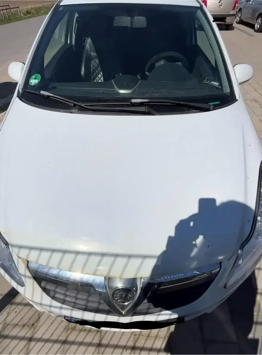 Gebraucht Opel Corsa 60 PS (44 kW) 2007 Weiß Kleinwagen