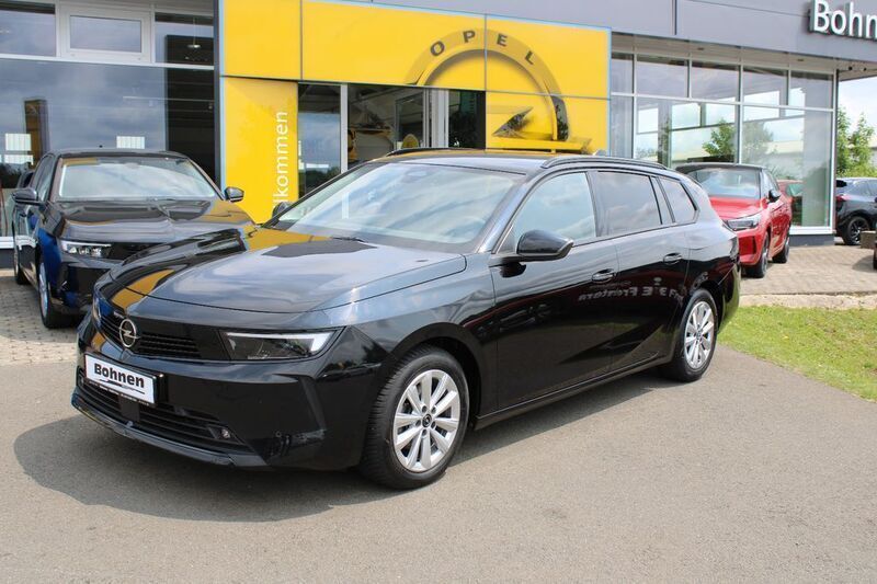 Lackierung schwarz perla nera/ Gebraucht 2024 Opel Astra Enjoy Kombi | 22.999 € (Fairer Preis) - Bild 1/4