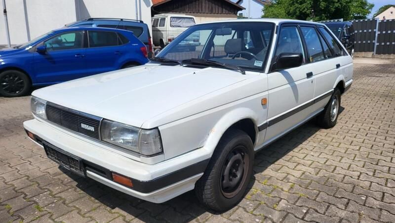 Weiß Gebraucht 1987 Nissan Sunny Limousine | 2.900 € - Bild 1/4