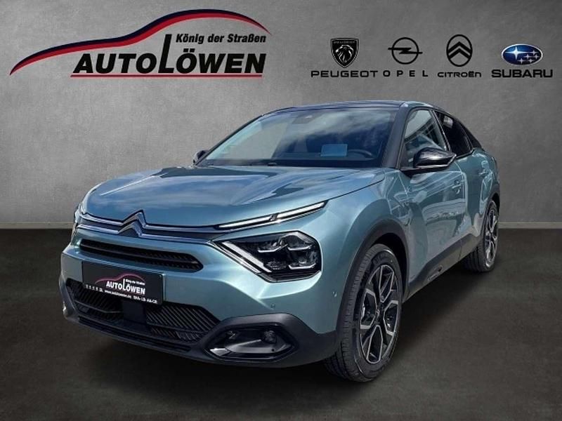 Islandblau (metalliclackieru Gebraucht 2024 Citroën e-C4 Shine Limousine | 23.250 € (Fairer Preis) - Bild 1/4