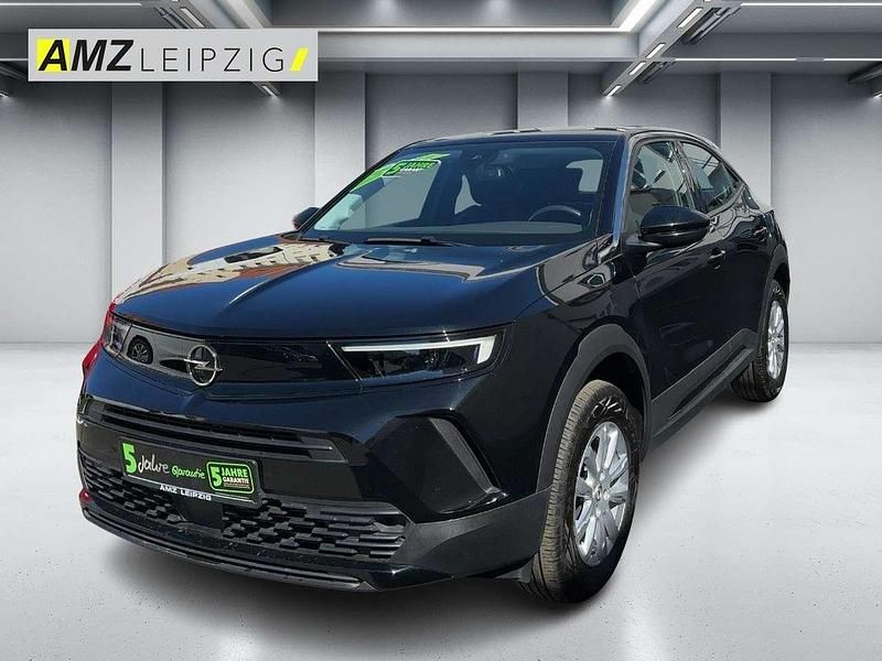 Gebraucht Opel Mokka Enjoy 131 PS (96 kW) 2023 Lackierung schwarz perla nera/typ aussen (metallic) SUV