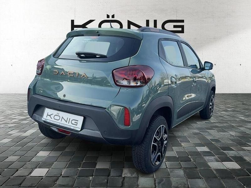 Gebraucht Dacia Spring Extreme 47 kW (65 PS) 2023 Grün "flechtengrau" Kleinwagen