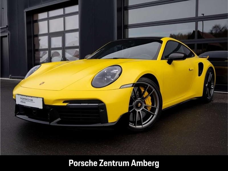 Racinggelb Gebraucht 2024 Porsche 911 Turbo S Coupé | 223.990 € - Bild 1/4