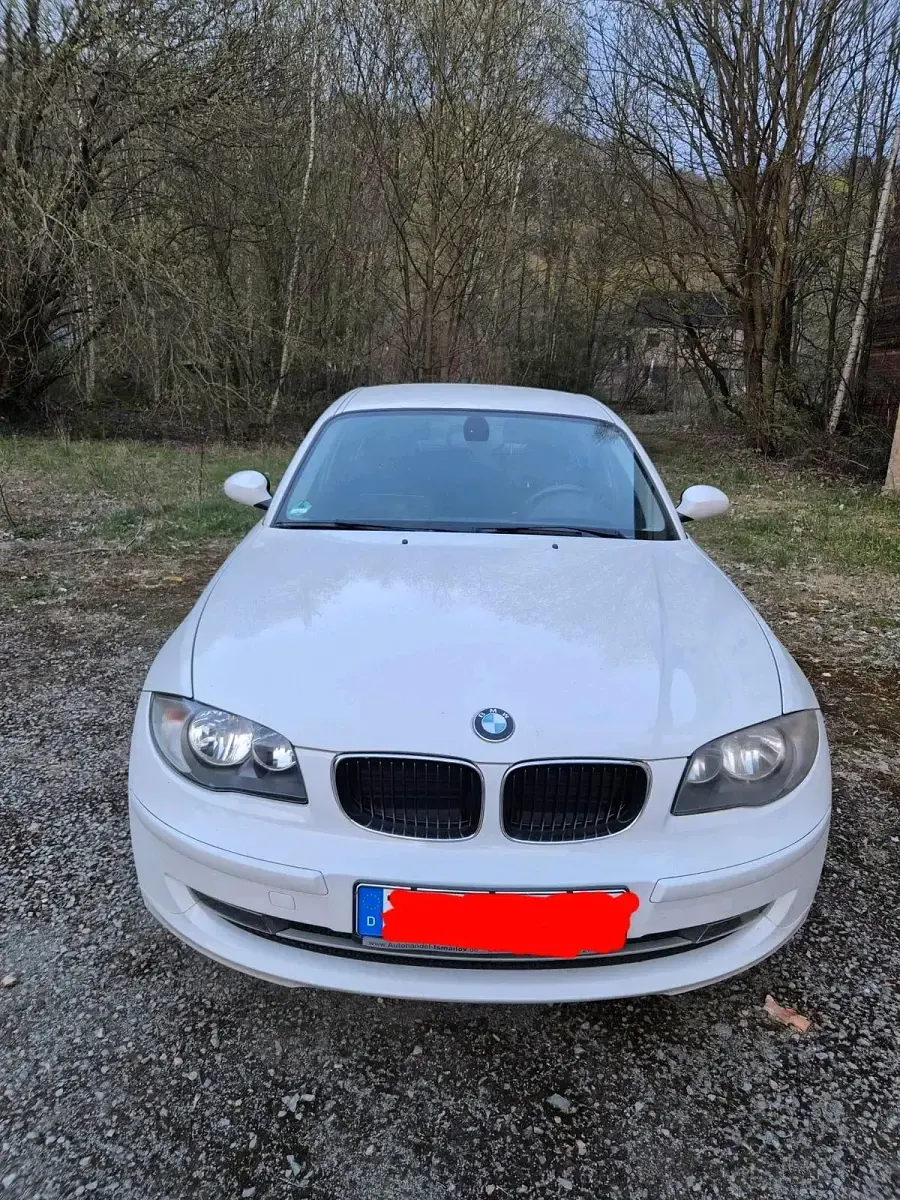 Używany BMW 116 122 KM (89 kW) 2008 Biały Hatchback