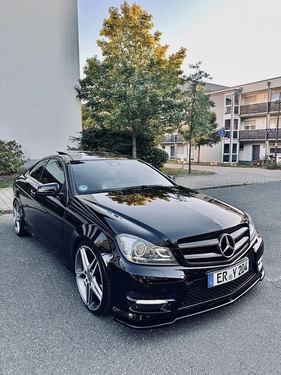 Schwarz Gebraucht 2014 Mercedes C250 AMG Coupé | 20.700 € (Superpreis) - Bild 1/4