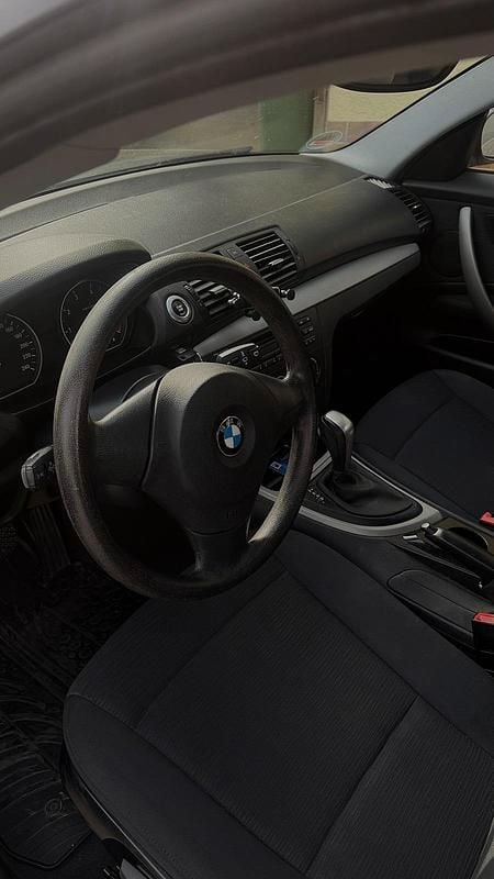 Second-hand BMW 116 116 CP (85 kW) 2009 Negru Hatchback