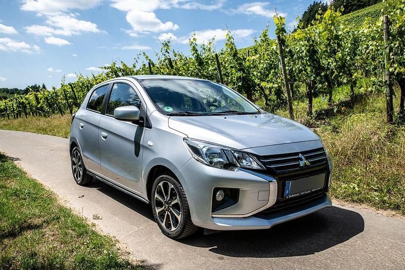 Grau Gebraucht 2021 Mitsubishi Space Star Spirit+ Kleinwagen | 10.500 € (Superpreis) - Bild 1/4
