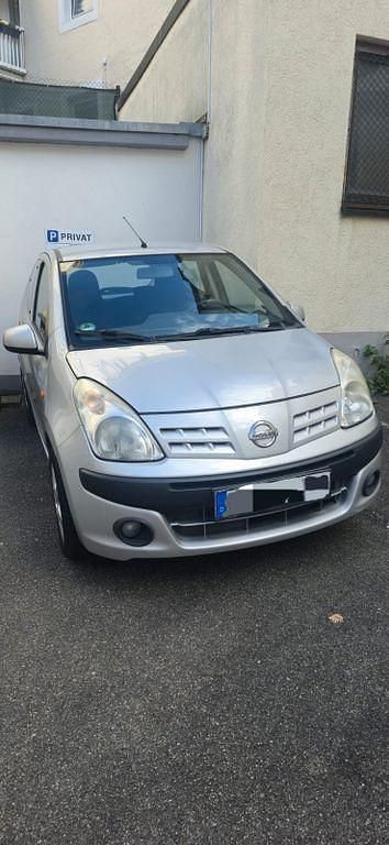 Grau Gebraucht 2009 Nissan Pixo Acenta Kleinwagen | 2.500 € (Fairer Preis) - Bild 1/4