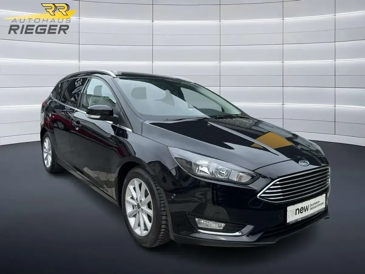 Gebraucht Ford Focus Titanium 125 PS (91 kW) 2015 Pantherschwarz metallic Kombi
