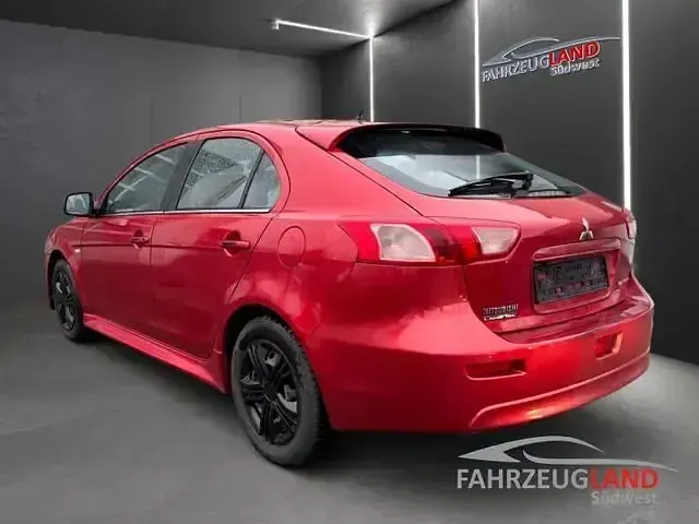 Gebraucht Mitsubishi Lancer Sportback 150 PS (110 kW) 2014 Rot Limousine