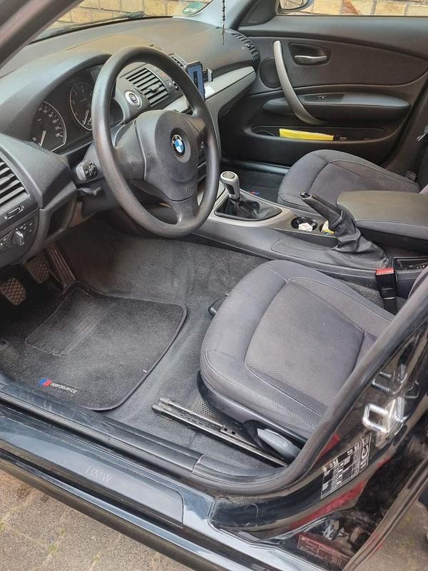 Gebraucht BMW 116 122 PS (89 kW) 2009 Schwarz Kleinwagen