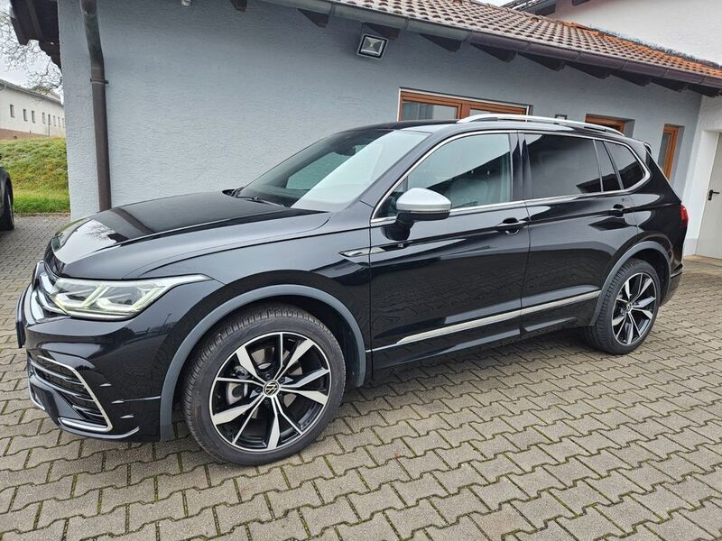 Schwarz Gebraucht 2024 VW Tiguan Allspace R-line SUV | 41.550 € (Fairer Preis) - Bild 1/4