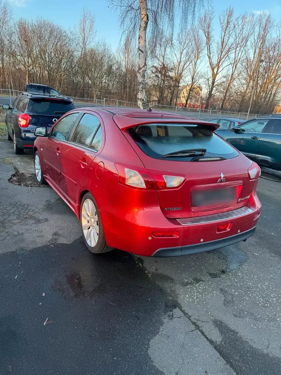 Gebraucht Mitsubishi Lancer 140 PS (102 kW) 2009 Rot Limousine