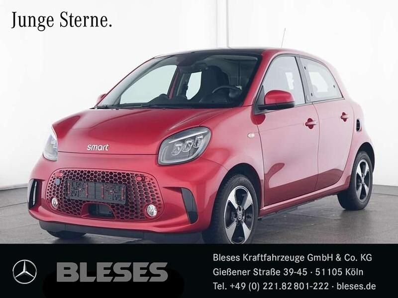 Karosserie in cadmium red () Gebraucht 2023 Smart ForFour Passion Exclusive Limousine | 17.900 € - Bild 1/4