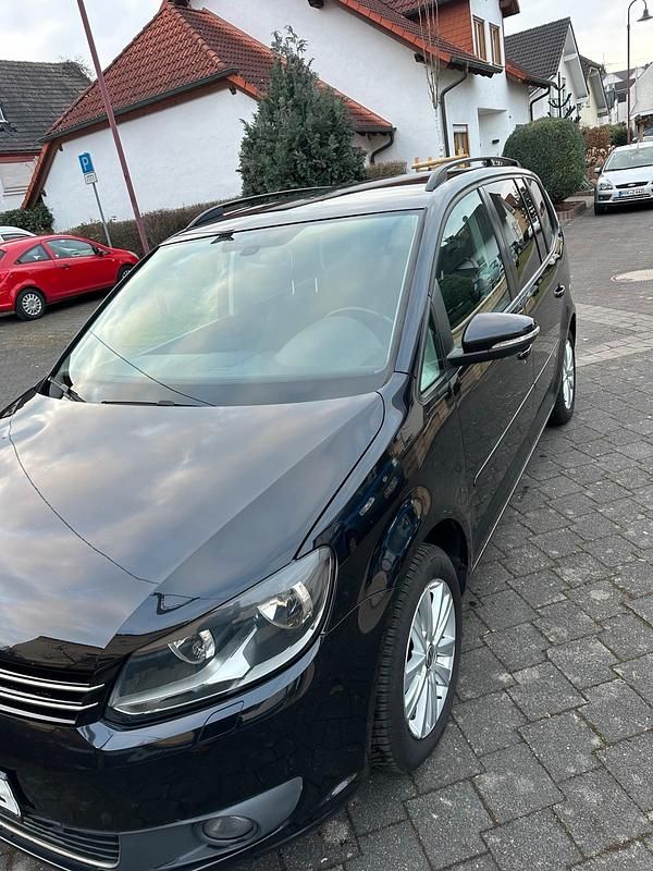 Gebraucht VW Touran 105 PS (77 kW) 2012 Schwarz Van / Kleinbus