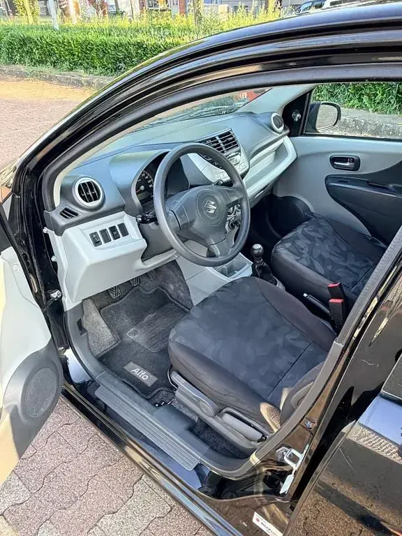 Gebraucht Suzuki Alto 68 PS (50 kW) 2011 Schwarz Kleinwagen
