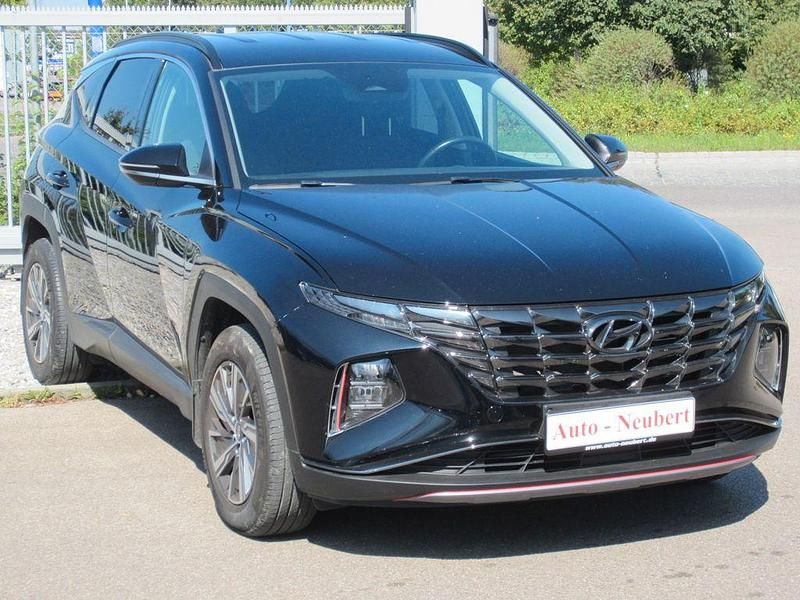 Phantom black (metallic) Gebraucht 2021 Hyundai Tucson Select SUV | 23.950 € (Fairer Preis) - Bild 1/4