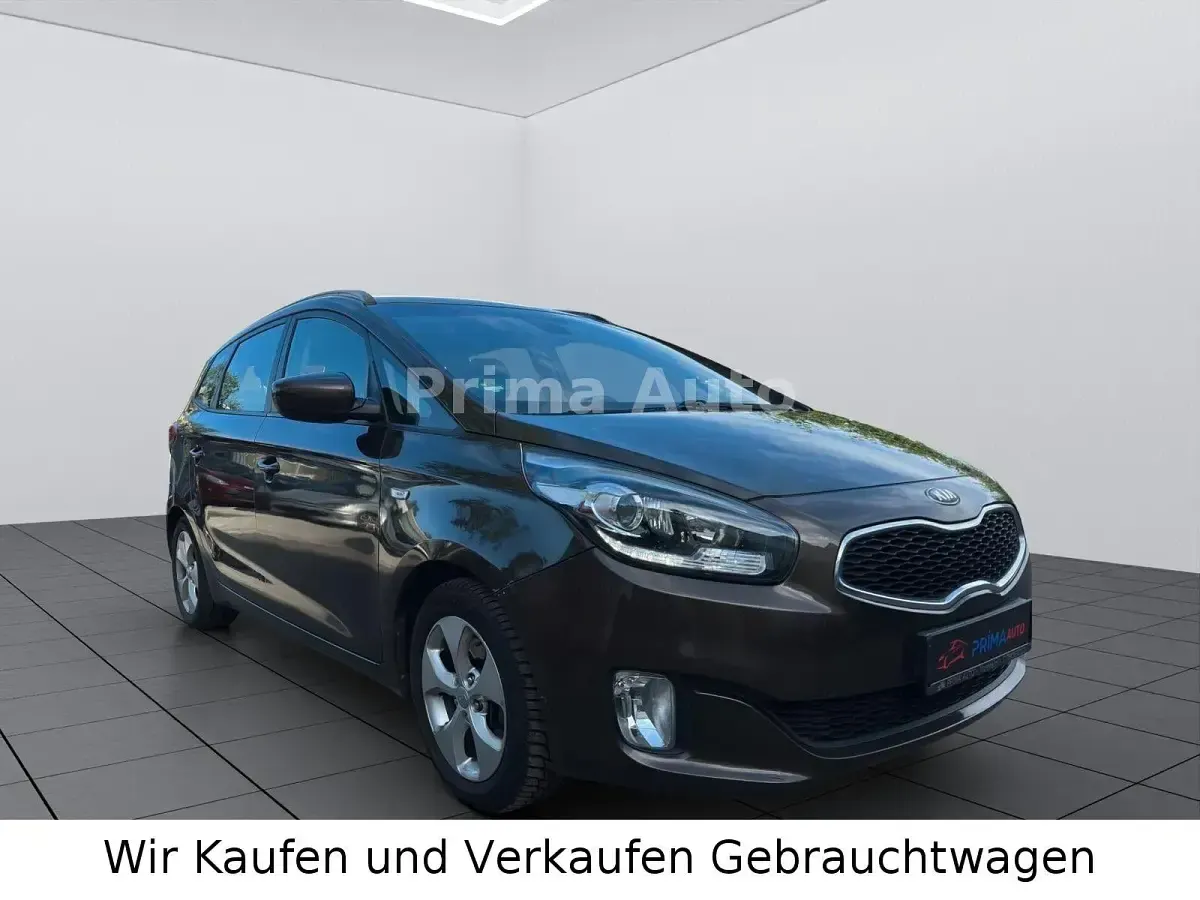 Gebraucht Kia Carens Edition 7 136 PS (100 kW) 2013 Braun Van / Kleinbus