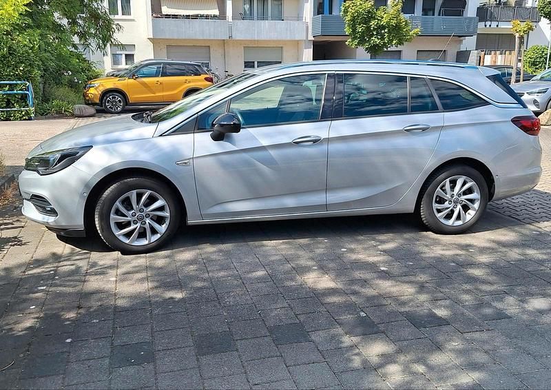 Silber Gebraucht 2022 Opel Astra Kombi | 10.900 € (Superpreis) - Bild 1/4
