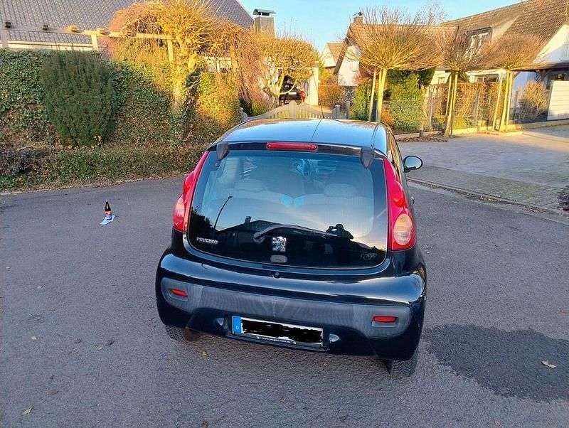 Gebraucht Peugeot 107 68 PS (50 kW) 2009 Schwarz Kleinwagen