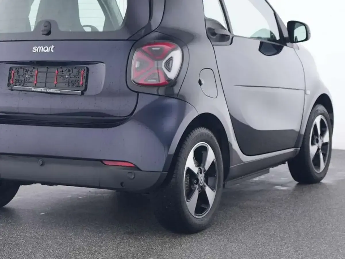 Gebraucht Smart ForTwo Coupé Exclusive 60 kW (82 PS) 2024 Bodypanels in sapphire blue (metallic) Kleinwagen