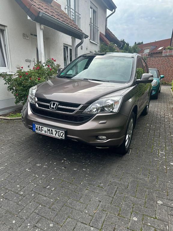 Braun Gebraucht 2011 Honda CR-V Executive SUV | 11.900 € (Teuer) - Bild 1/4