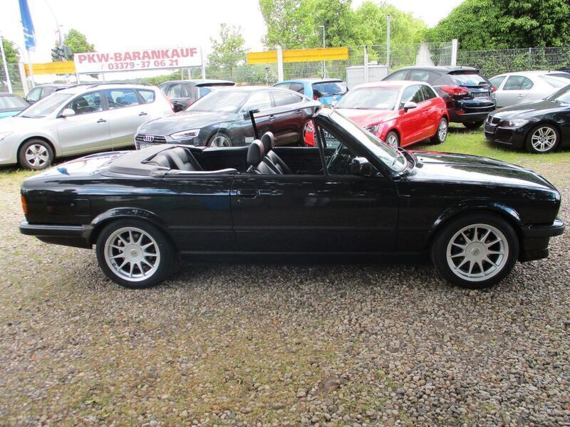 Diamantschwarz Gebraucht 1987 BMW 325 Cabriolet Performance Cabrio | 15.900 € - Bild 1/4