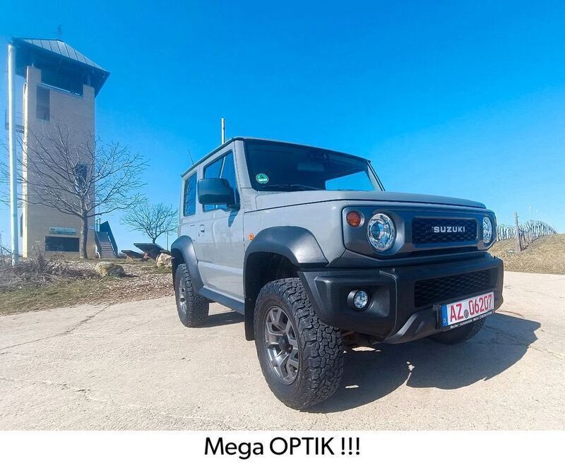Grau Gebraucht 2019 Suzuki Jimny Comfort+ SUV | 29.900 € (Fairer Preis) - Bild 1/4