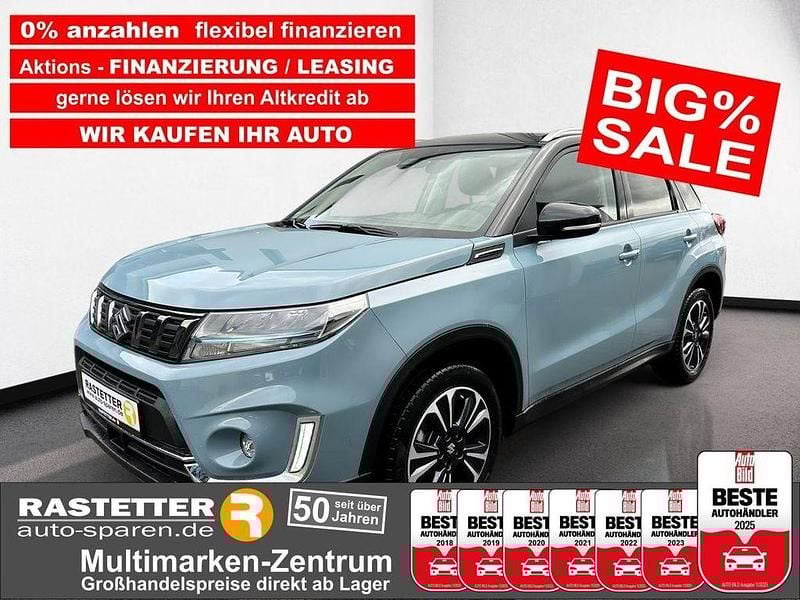Ice greyish blue/cosmic black pearl Gebraucht 2022 Suzuki Vitara Comfort+ SUV | 22.770 € (Fairer Preis) - Bild 1/4